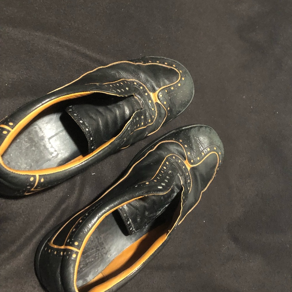 Cole Haan Black and Orange Loafers with Sleek Design